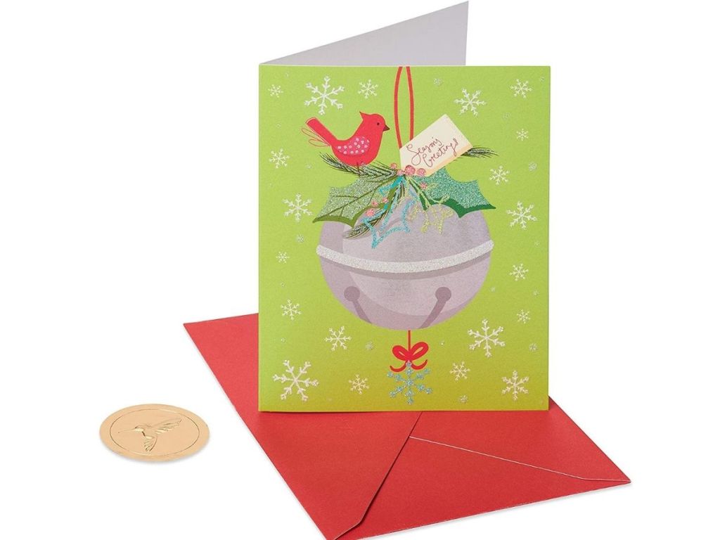 bird and bell Christmas card with red envelope and gold seal