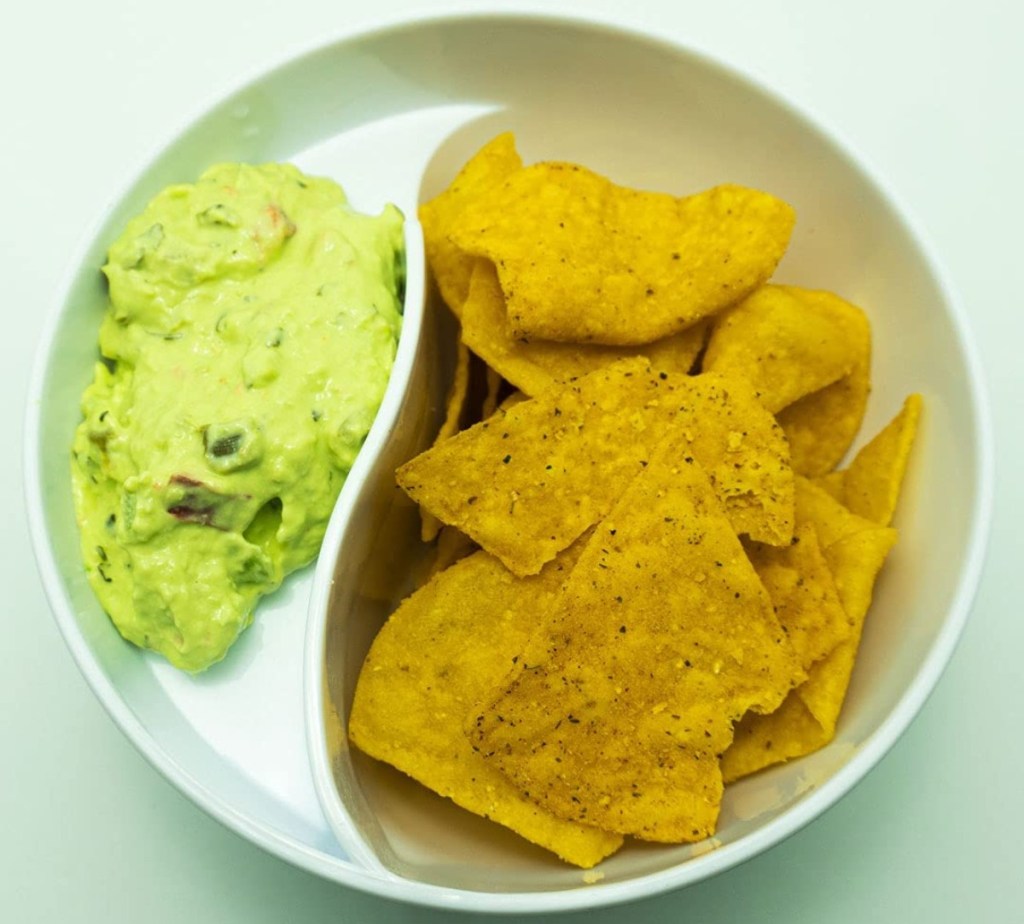 divided bowl with chips and guacamole