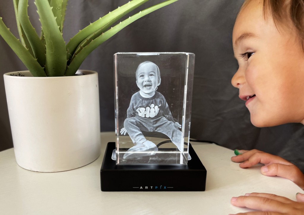 boy looking at photo crystal