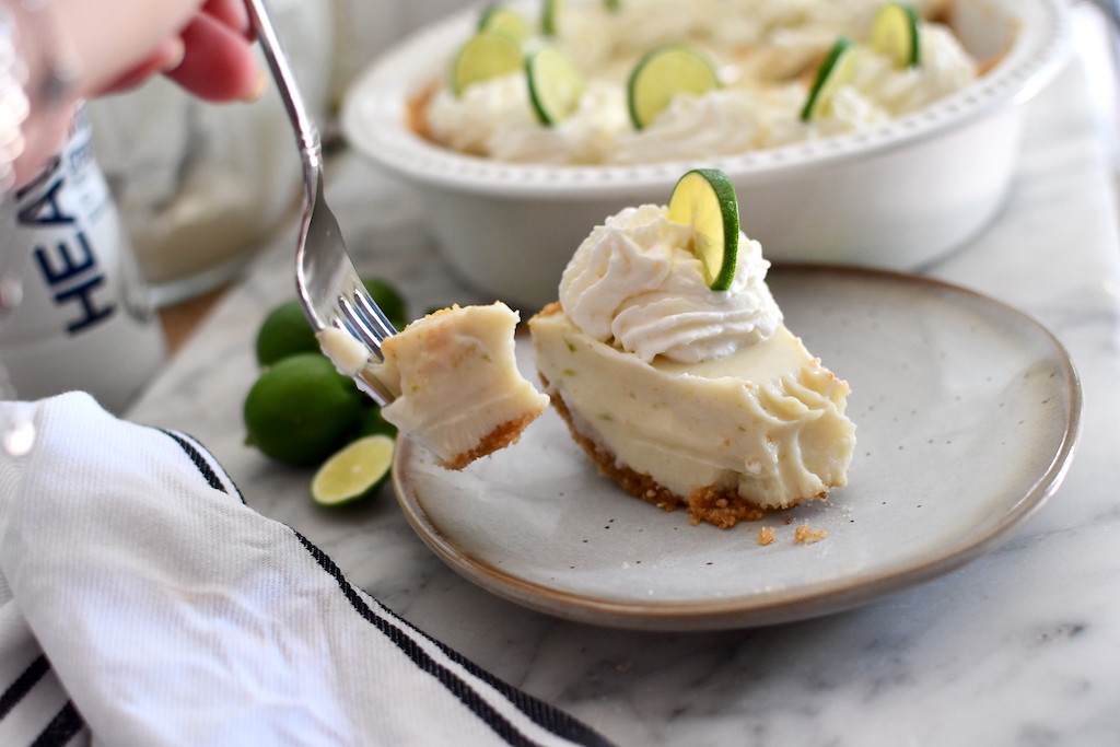 taking bite of key lime pie 