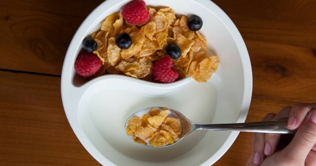 divided cereal bowl with mik and cereal