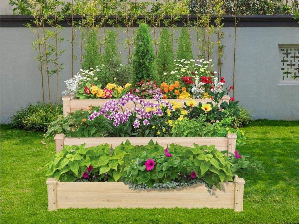 garden box filled with flowers in back yard