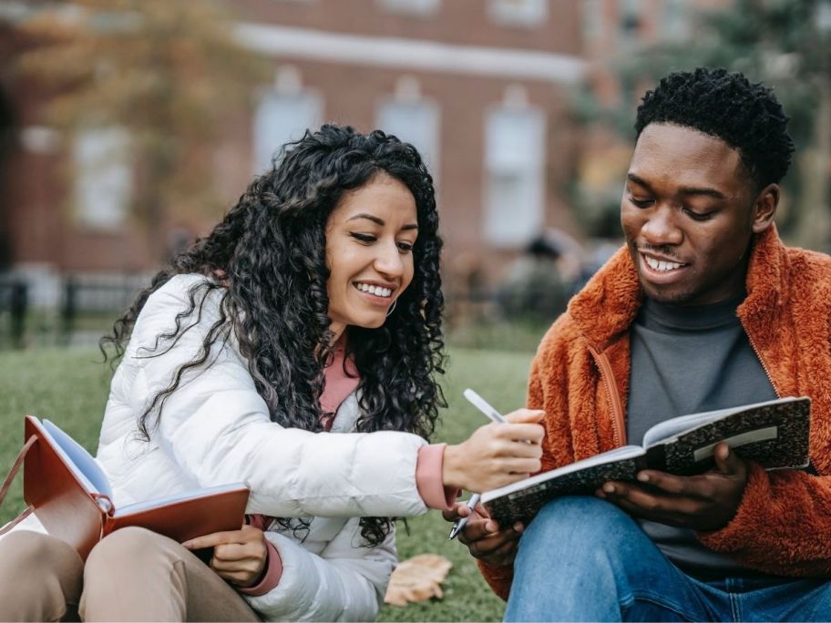 College Students helping each other study