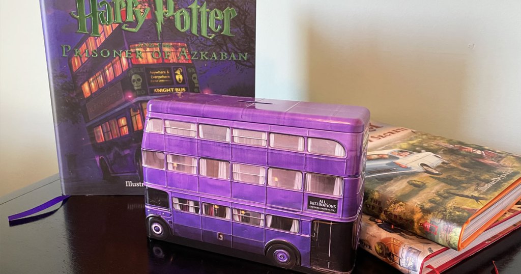 harry potter bus tin in front of harry potter books