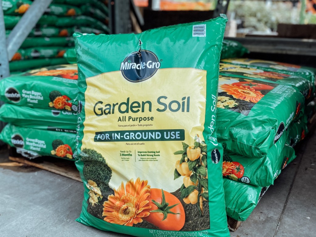 Bag of Miracle Gro Garden Soil on display at Home Depot