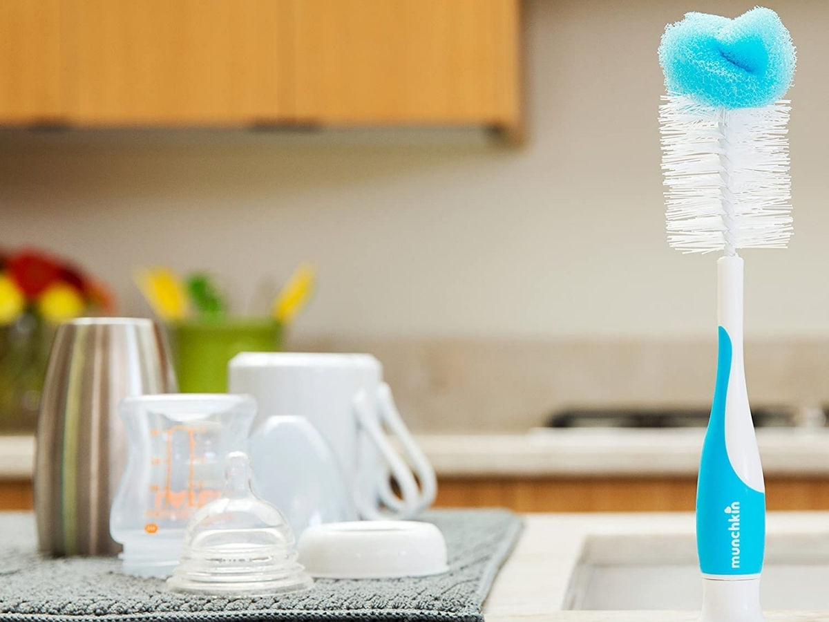 munchkin bottle brush sponge standing on counter