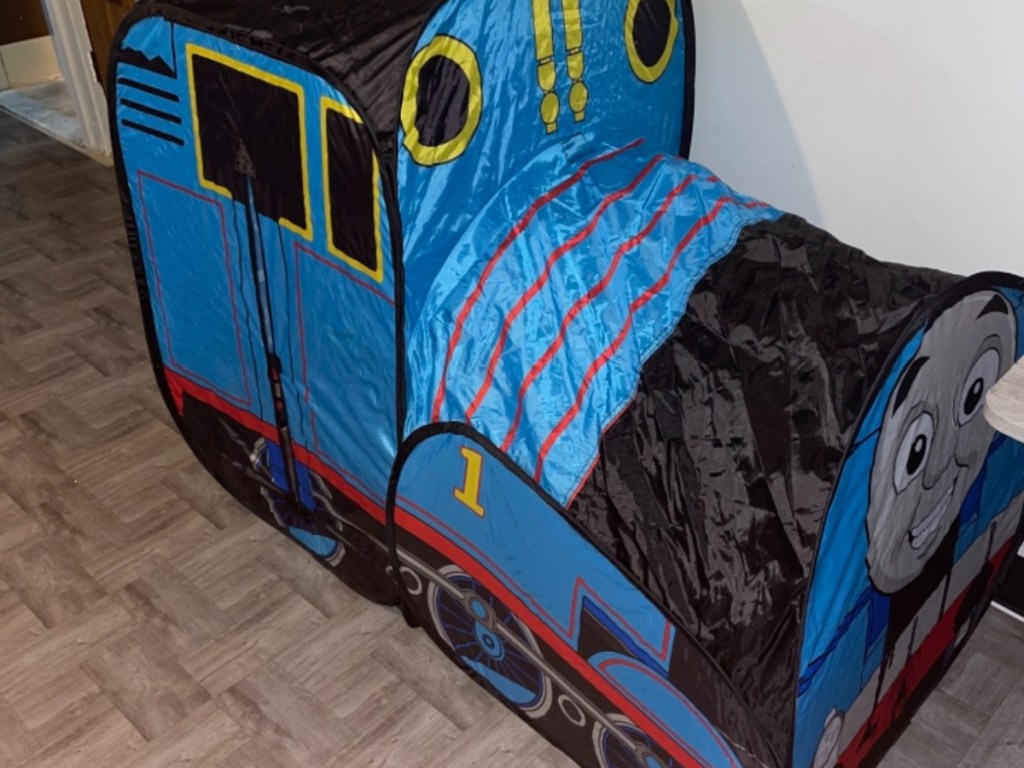 blue kids tent shaped like a train