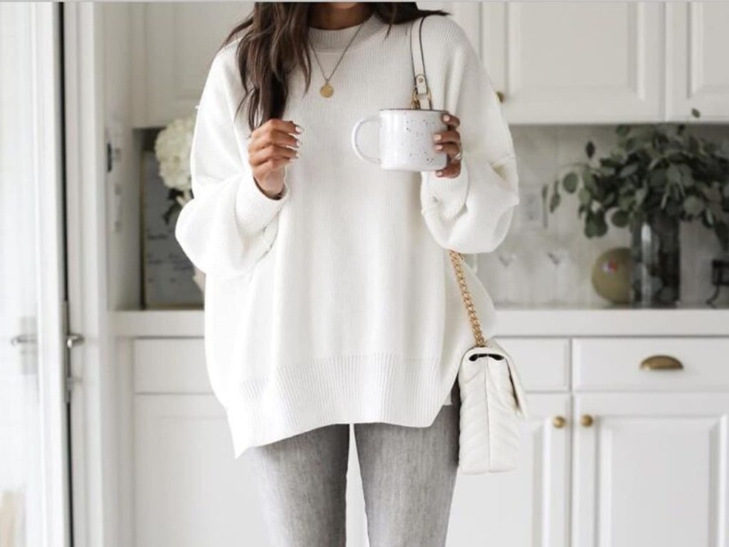 woman wearing white sweater in kitchen