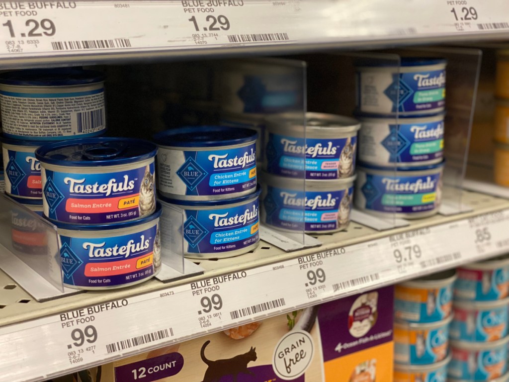 cat food cans sitting on store shelf