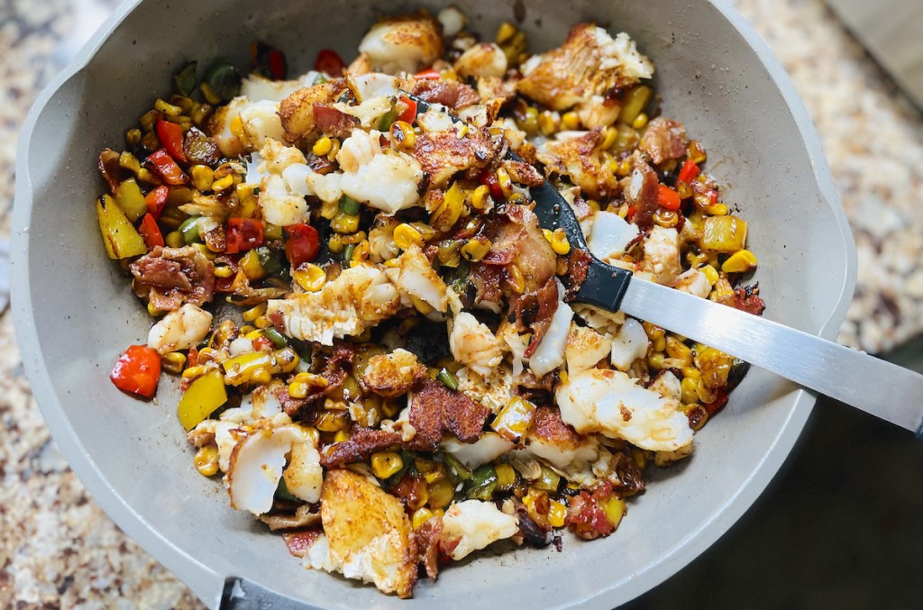 close up of sauté pan with fish tacos