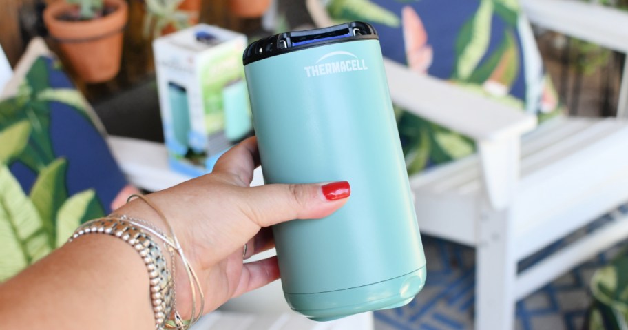 holding up a thermacell mosquito repellent device