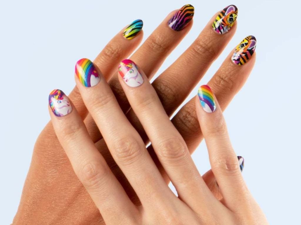 hands with designs on nails