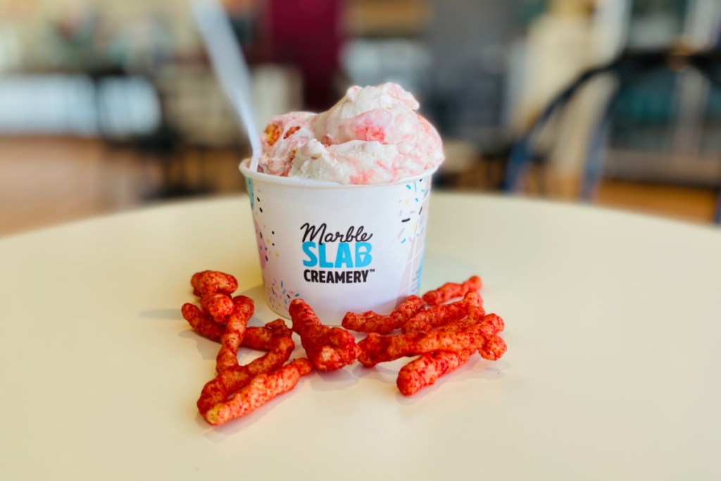 Hot Cheetos around a Marble Slab ice cream cup