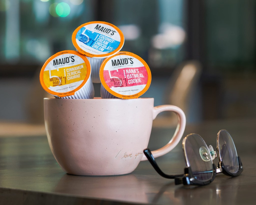 mauds super coffee pods in coffee mug