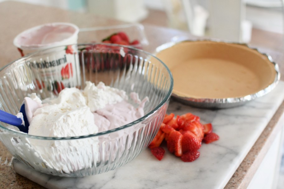 mixing frozen yogurt pie