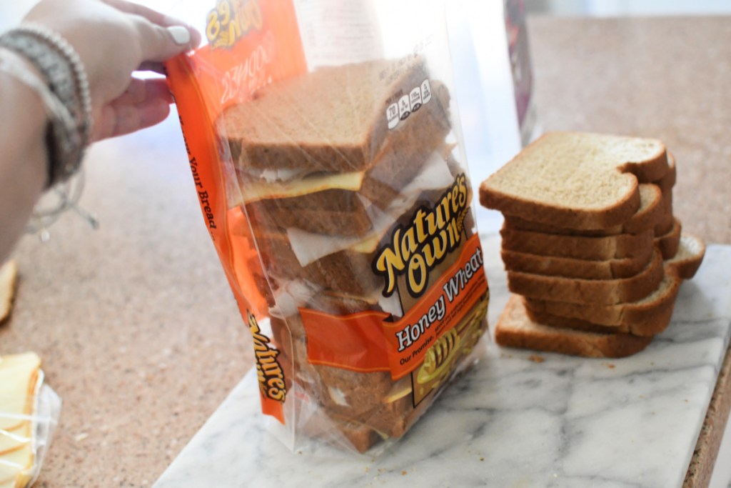 placing sandwiches back into the bread bag