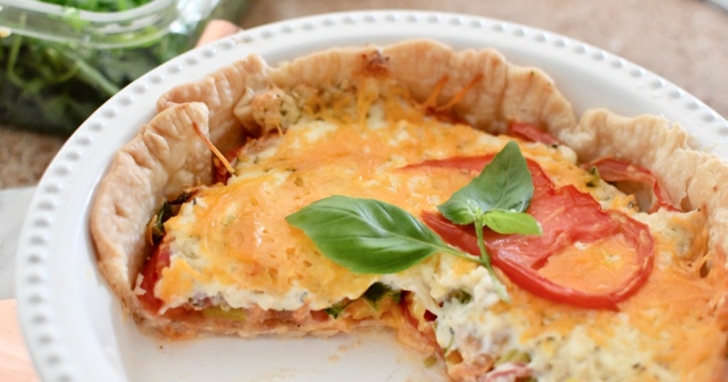 tomato pie sliced in a pie pan