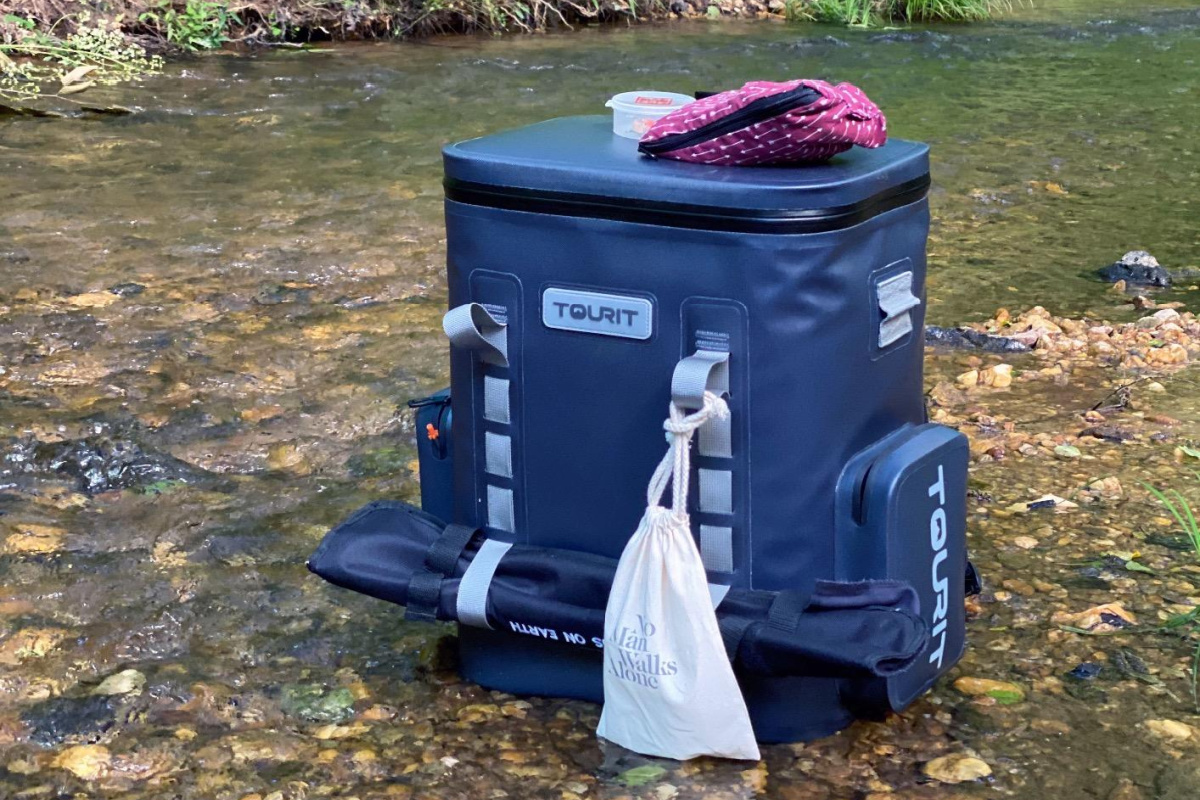 Backpack cooler in river