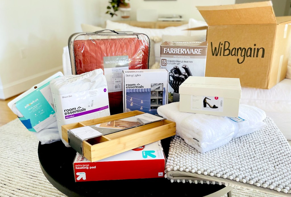 various home items on coffee table with wibargain box in background