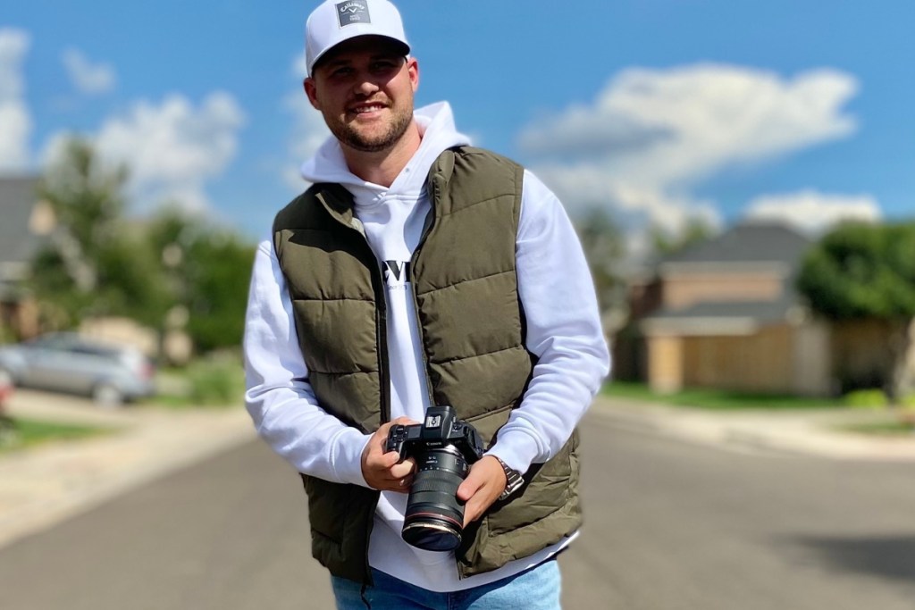 32 degrees mens vest with man standing in road