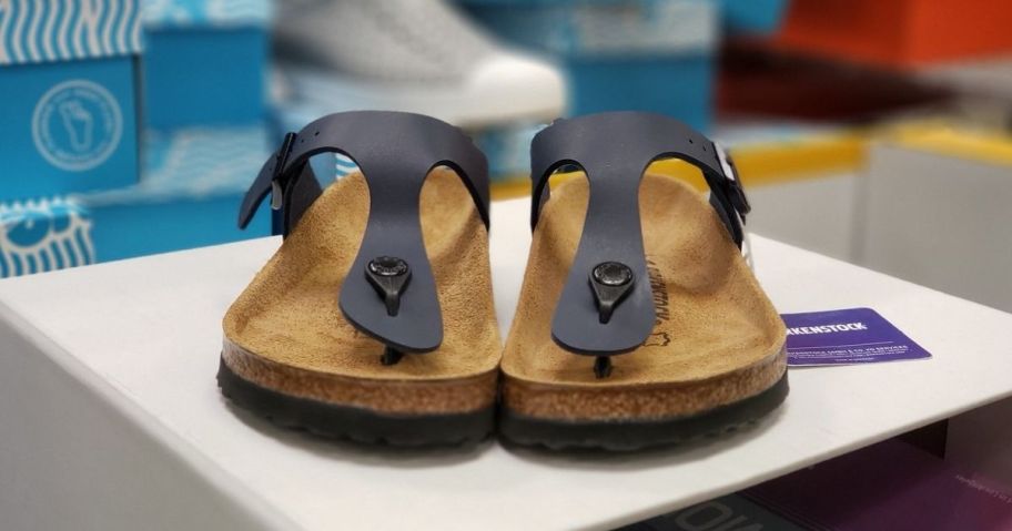 pair of black Birkenstocks Sandals