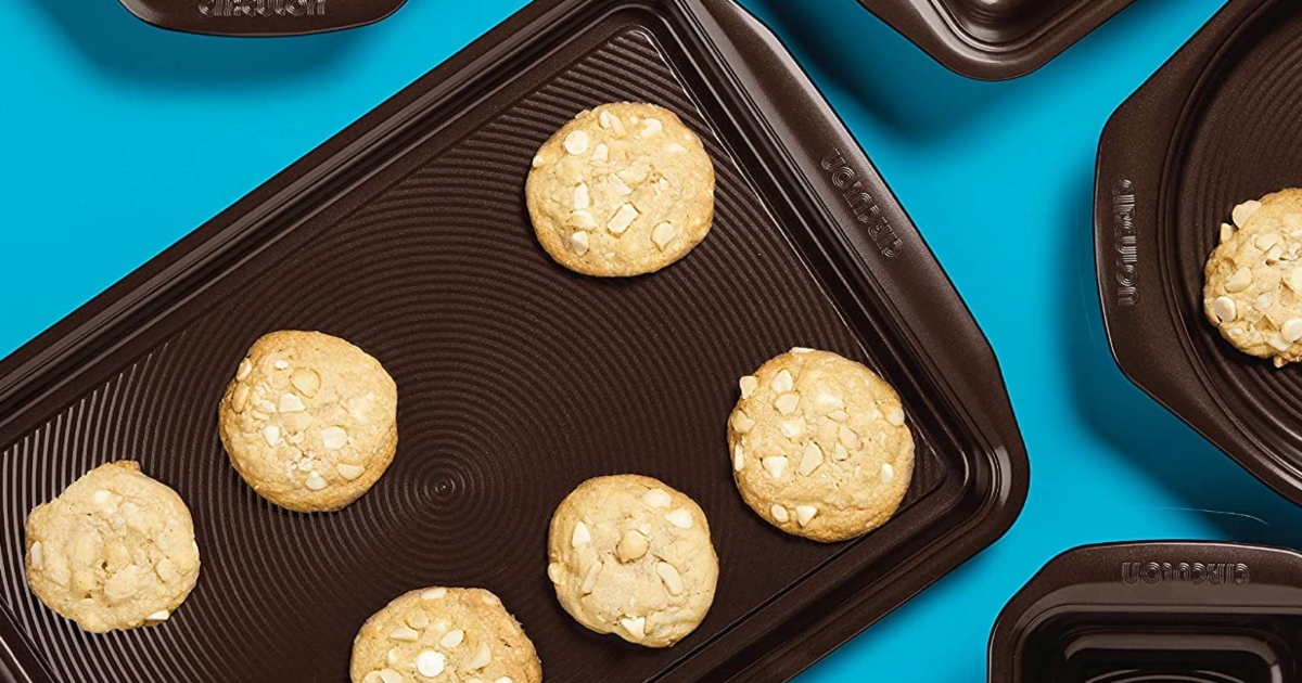 bakeware with cookies on them that have just been baked