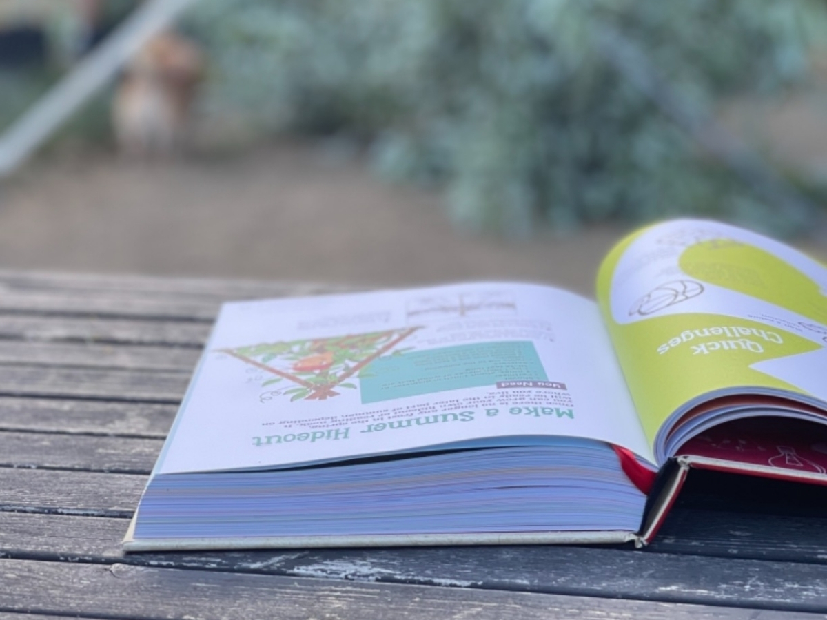 the highlights book of things to do laying open on table outside