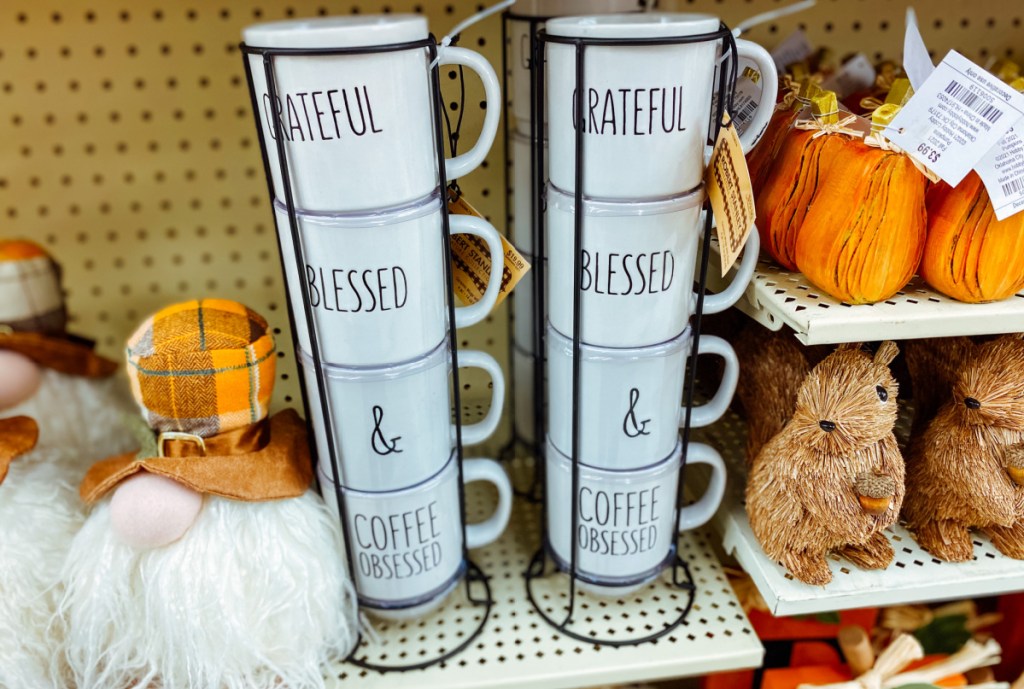 stack of fall coffee mugs at hobby lobby