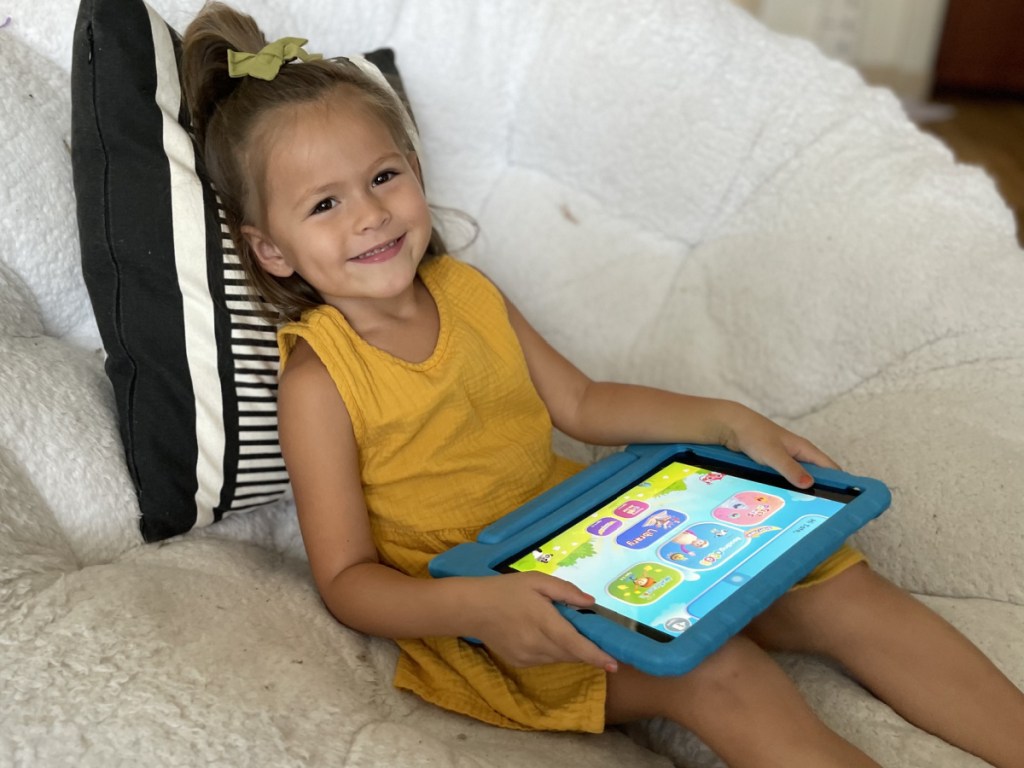 girl playing reading eggs on ipad