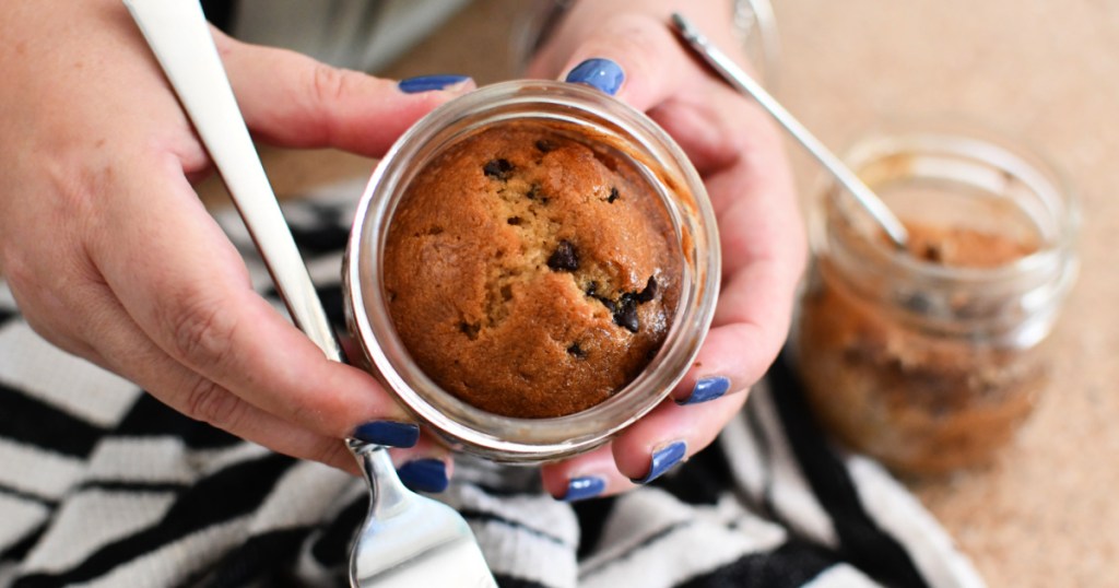 holding a jar of banana bread