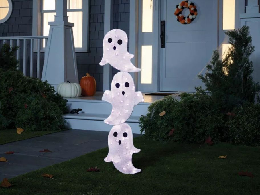 stacked ghost lights in front yard