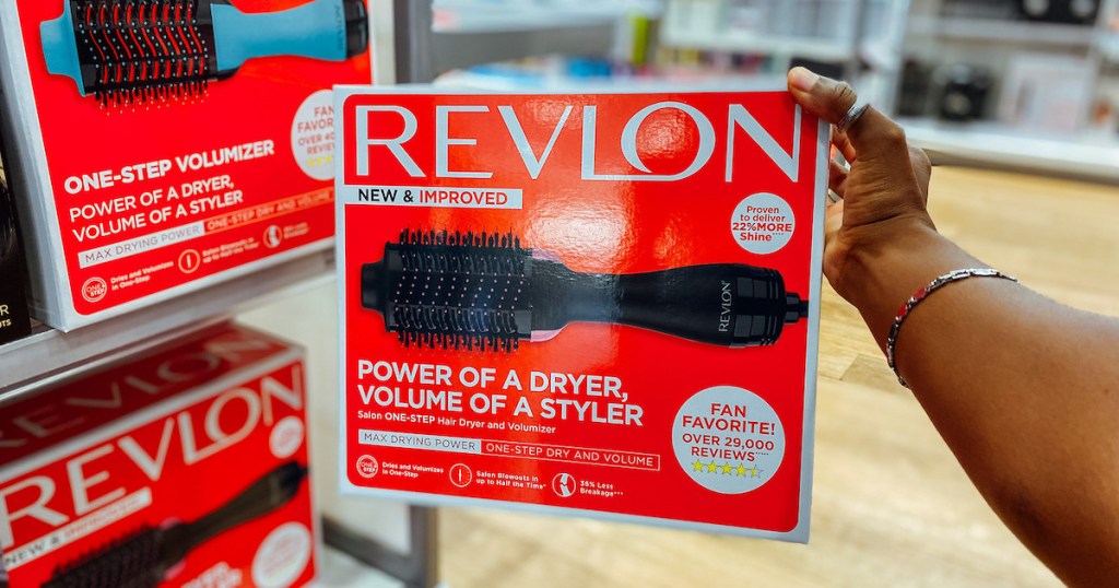 hand holding revlon one step hair dryer at ulta hair event