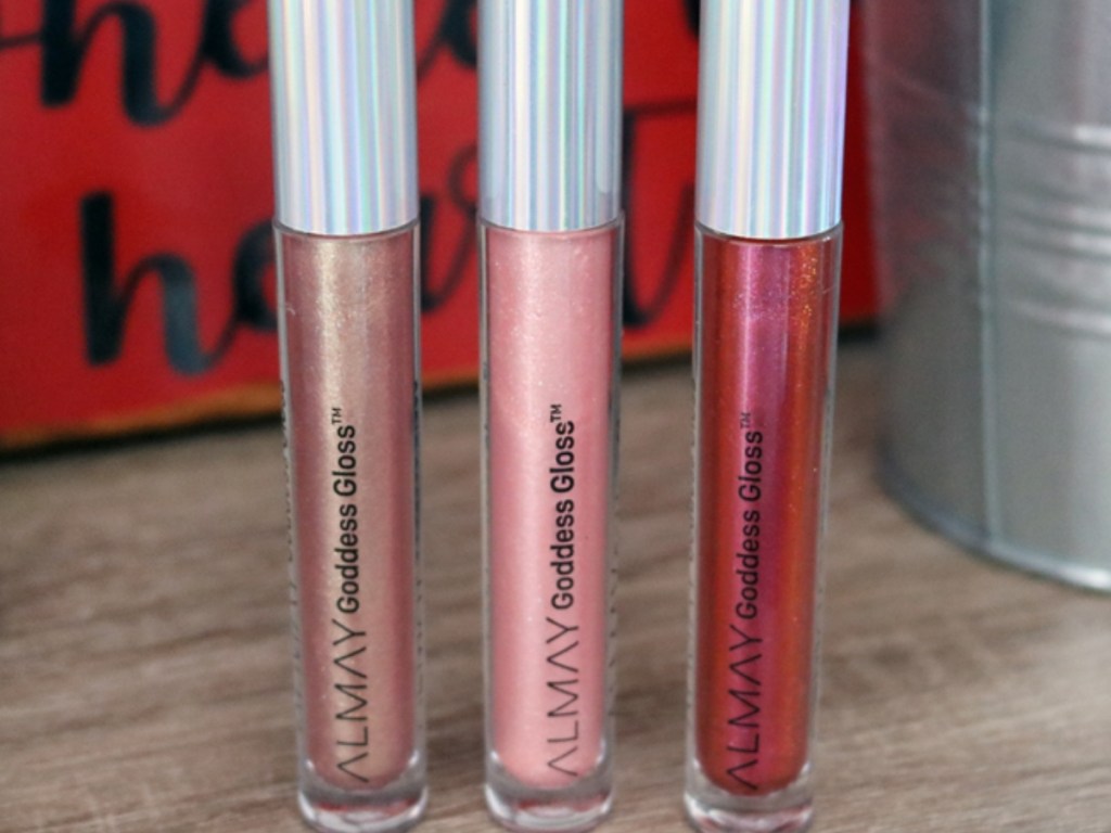 three bottles of almay goddess gloss lip gloss