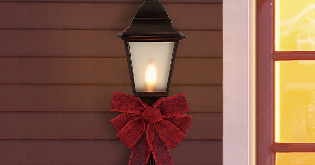 red bow on outdoor light