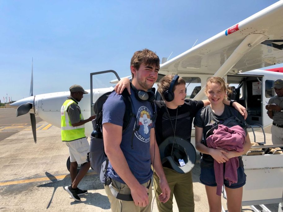 brothers and sister about to get on helicopter experience gift ideas