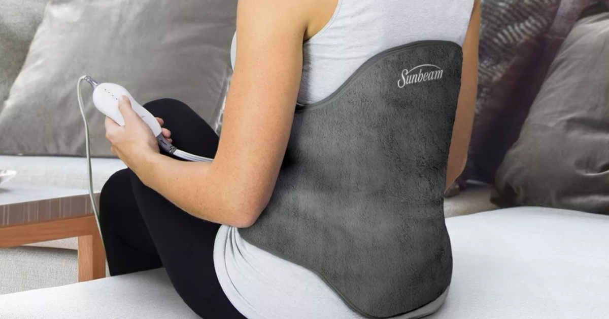 woman wearing sunbeam heated back wrap