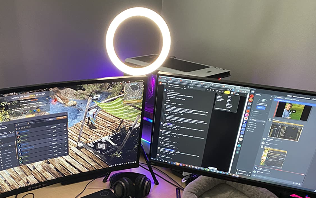 two onlineputer monitors and a ring light