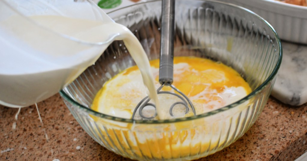 adding cream to custard filling