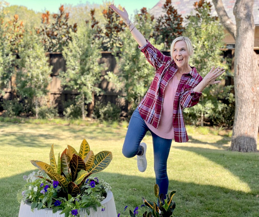 woman with hands in air modeling walmart fall fashion outfit