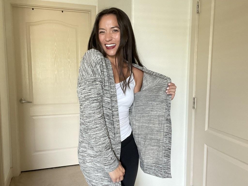 woman wearing marled gray cardigan