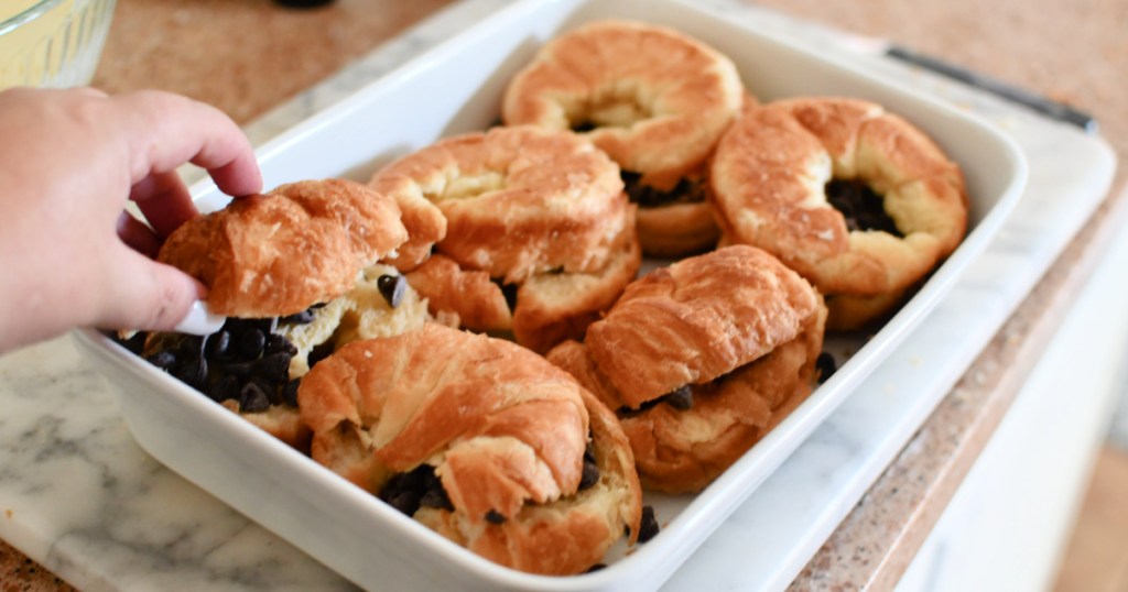 placing the tops on croissants