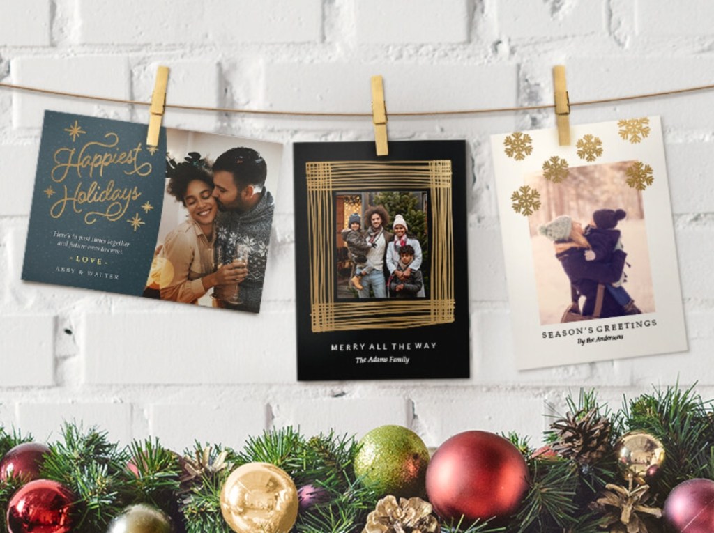 christmas cards hanging with clothespins