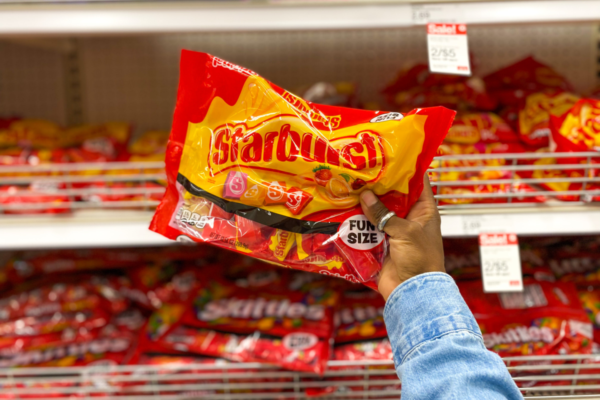 Bag of Starburst in front of Skittles