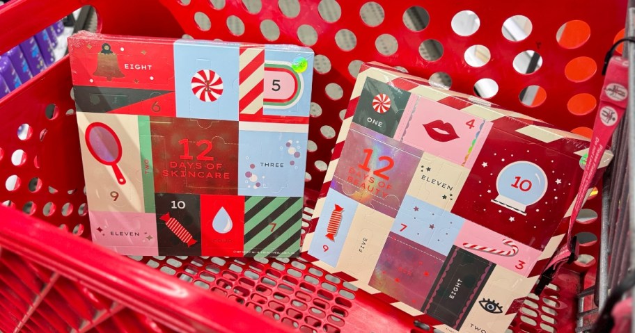 12 Days of Beauty and 12 Days of Skincare Advent Calendars in boxes with beauty and holiday themed images in a red Target shopping cart