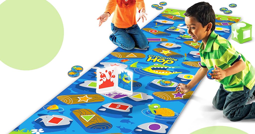 kids play crocodile floor game