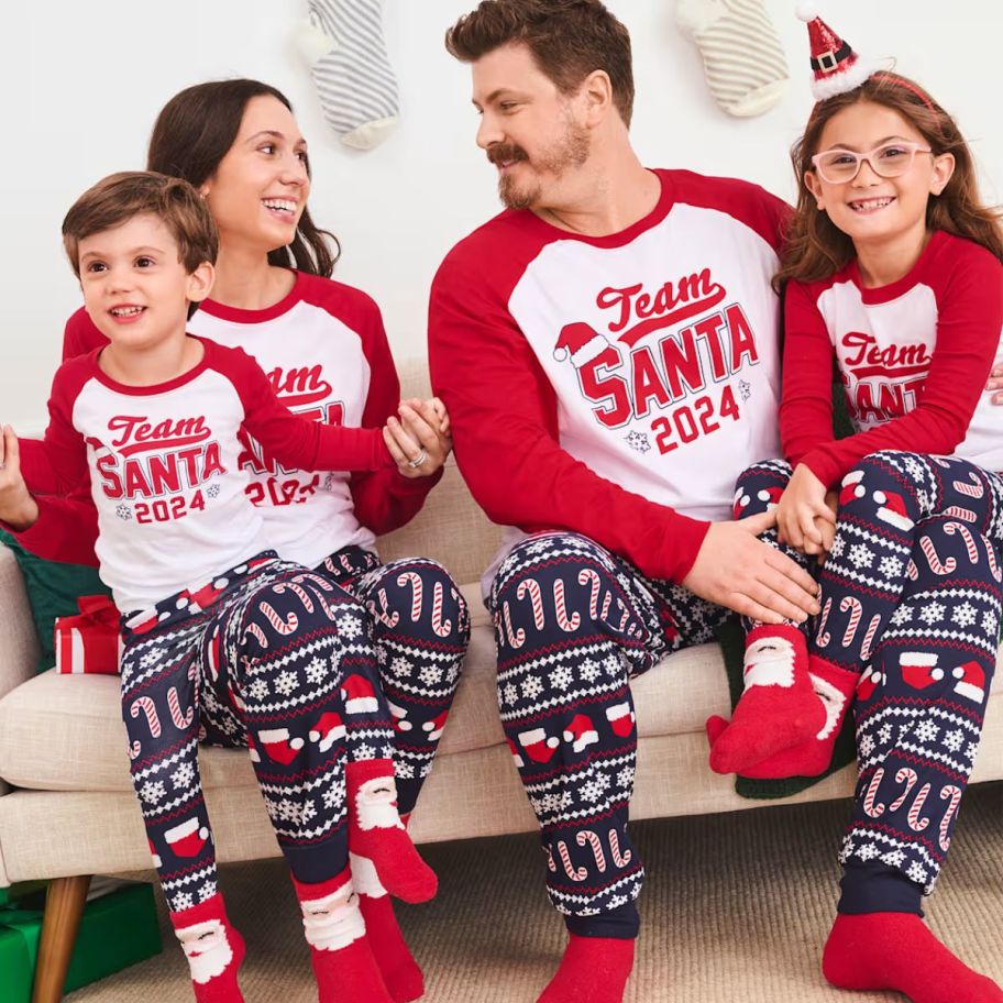 a family wearing matching christmas pajamas 