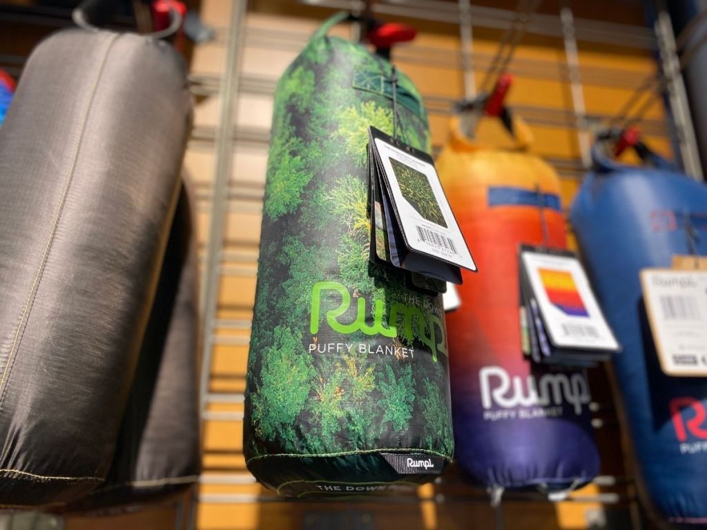 Rumpl blankets hanging in store