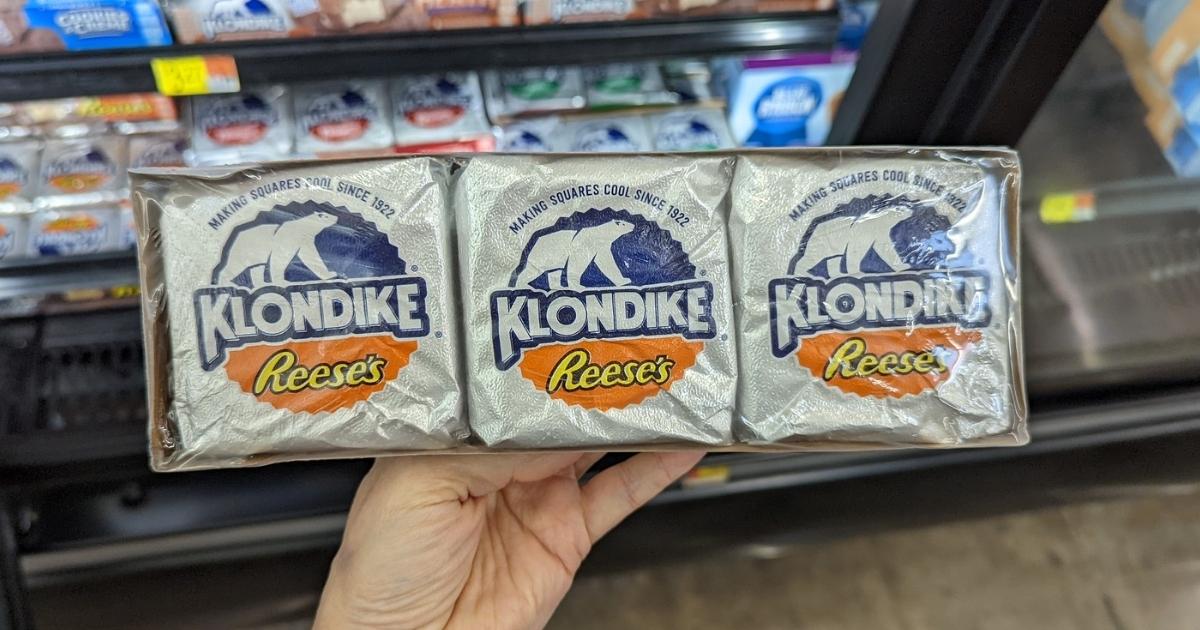 hand holding reese's klondike bars in store