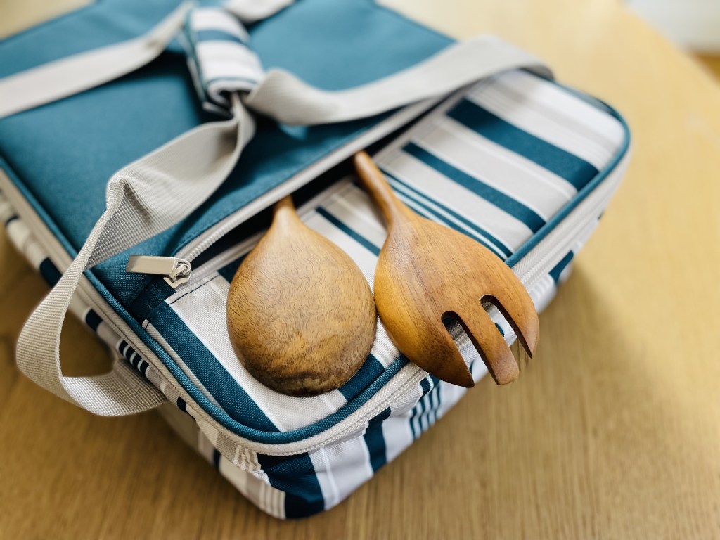 casserole carrier with wooden utensils