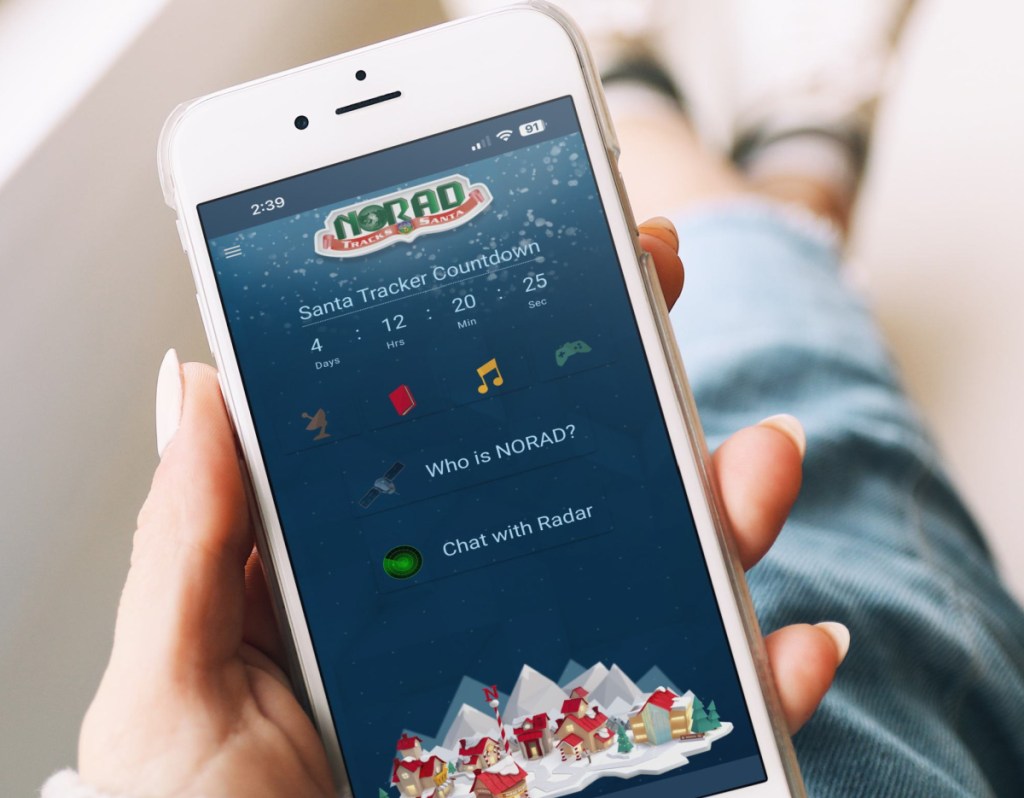 Person browsing the NORAD Santa Tracker app on their phone